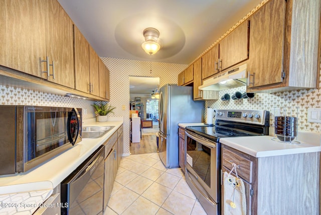 1240 Cheney Hwy Unit F, Titusville, FL 32780 - kitchen featuring stainless steel electric stove, under cabinet range hood, black microwave, dishwasher, and ceiling fan