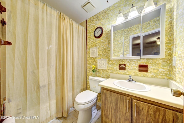 1240 Cheney Hwy Unit F, Titusville, FL 32780 - full bathroom featuring wallpapered walls, tile patterned flooring, vanity, and a shower with shower curtain