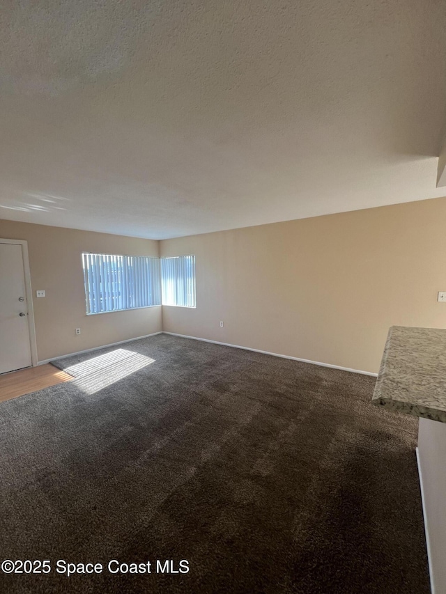 800 N Fiske Blvd Unit 613, Cocoa, FL 32922 - carpeted spare room with a textured ceiling