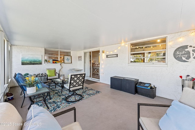 3127 Marshall Dr, Melbourne, FL 32901 - carpeted living room featuring a textured wall