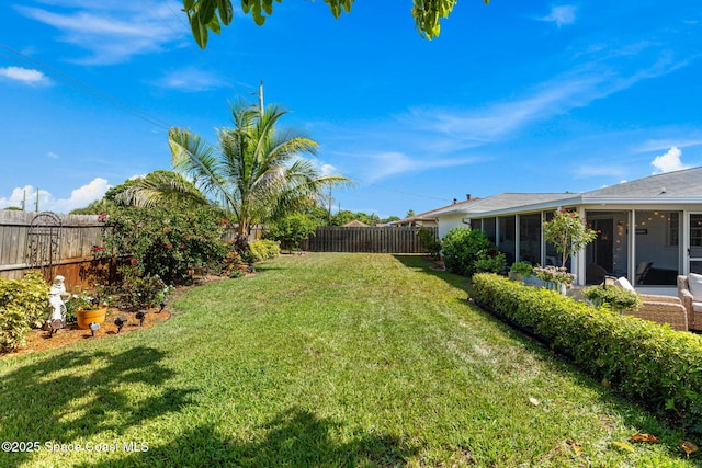 3127 Marshall Dr, Melbourne, FL 32901 - fenced backyard featuring a sunroom