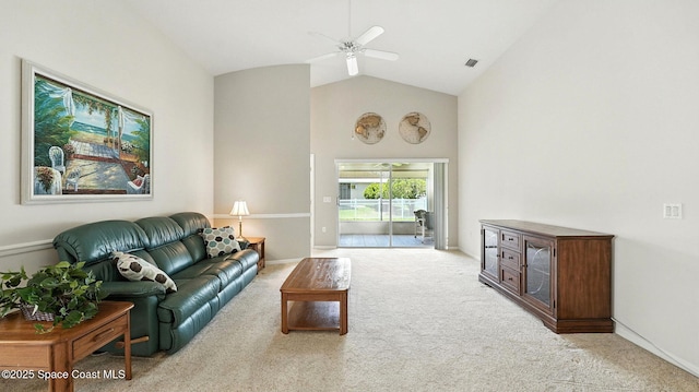 7927 Citrus Creek Dr, Melbourne, FL 32940 - living room with high vaulted ceiling, carpet flooring, and a ceiling fan