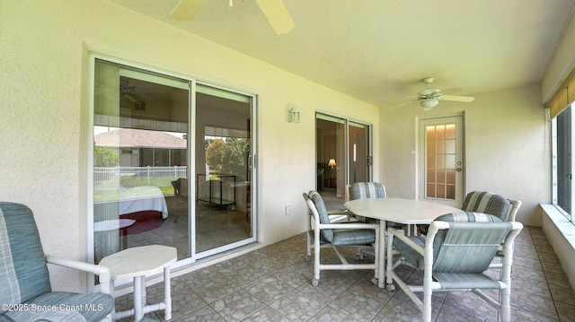 7927 Citrus Creek Dr, Melbourne, FL 32940 - sunroom / solarium with a ceiling fan and outdoor dining space