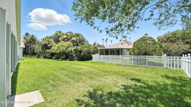 7927 Citrus Creek Dr, Melbourne, FL 32940 - fenced backyard with a sunroom