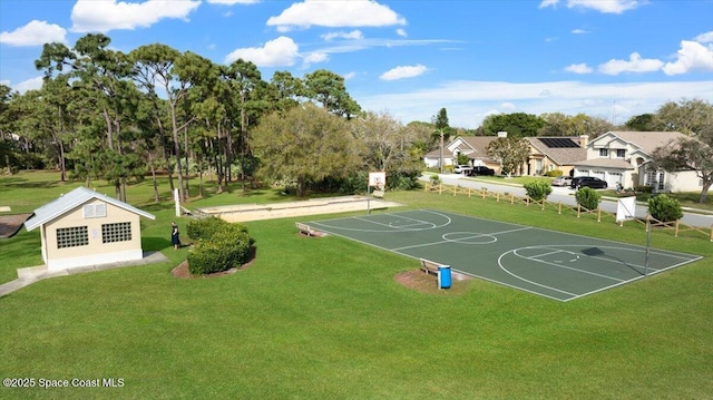 7927 Citrus Creek Dr, Melbourne, FL 32940 - view of basketball court with community basketball court, a yard, and view of scattered trees