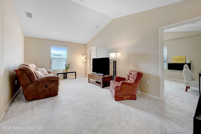 2248 Attilburgh Blvd, West Melbourne, FL 32904 - living area featuring carpet flooring and vaulted ceiling