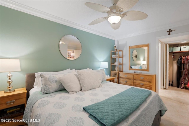 2375 S Atlantic Ave Unit 302, Cocoa Beach, FL 32931 - bedroom with crown molding, a closet, a ceiling fan, and a spacious closet