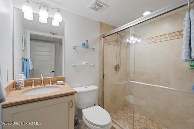 2375 S Atlantic Ave Unit 302, Cocoa Beach, FL 32931 - full bathroom featuring vanity and a shower stall