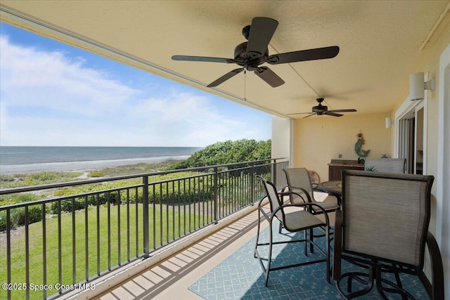 2375 S Atlantic Ave Unit 302, Cocoa Beach, FL 32931 - balcony featuring view of water and beach and ceiling fan