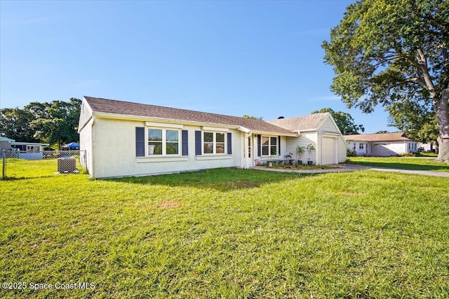 1638 Riviera Dr NE, Palm Bay, FL 32905 - view of front of property with a garage, driveway, and stucco siding