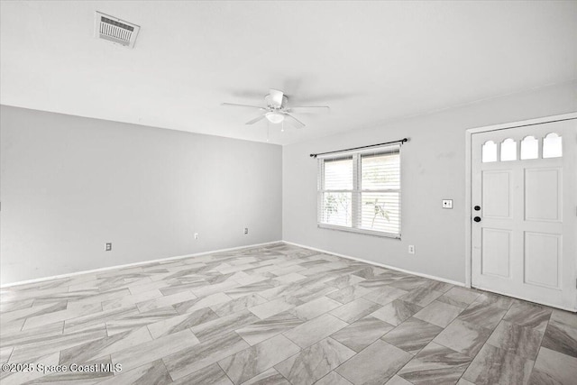1638 Riviera Dr NE, Palm Bay, FL 32905 - entryway featuring ceiling fan and baseboards