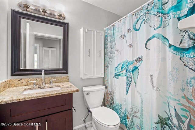 1638 Riviera Dr NE, Palm Bay, FL 32905 - bathroom featuring vanity and a shower with shower curtain