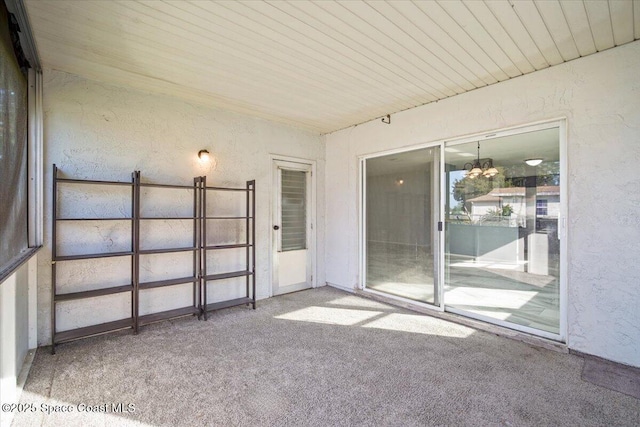 1638 Riviera Dr NE, Palm Bay, FL 32905 - unfurnished sunroom with a chandelier
