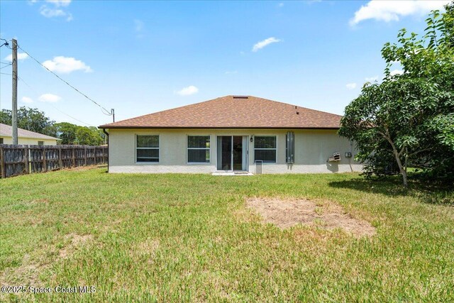 781 Dinner St NE, Palm Bay, FL 32907 - rear view of property featuring stucco siding