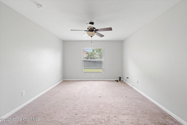 781 Dinner St NE, Palm Bay, FL 32907 - spare room with ceiling fan, light carpet, and a textured ceiling
