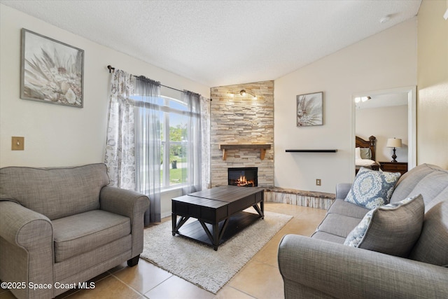 149 Hawthorne Ln NE, Palm Bay, FL 32907 - tiled living room with lofted ceiling, a stone fireplace, and a textured ceiling