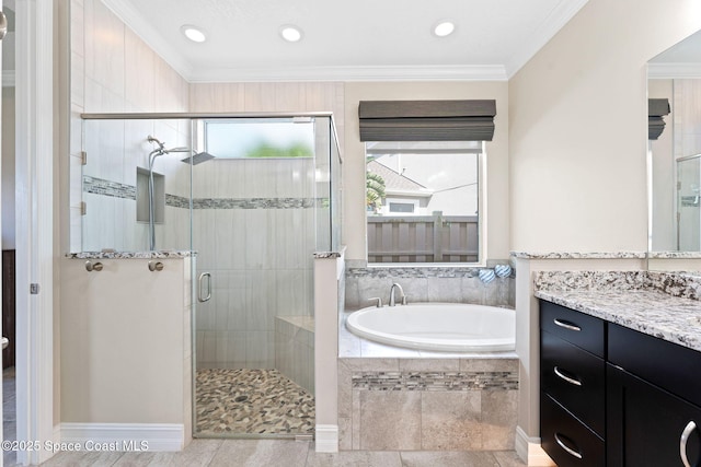 7684 Poulicny Ln, Melbourne, FL 32940 - bathroom with a bath, vanity, a shower stall, crown molding, and recessed lighting