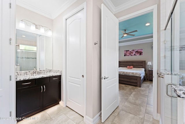 7684 Poulicny Ln, Melbourne, FL 32940 - bathroom with ensuite bathroom, vanity, a shower stall, ceiling fan, and ornamental molding