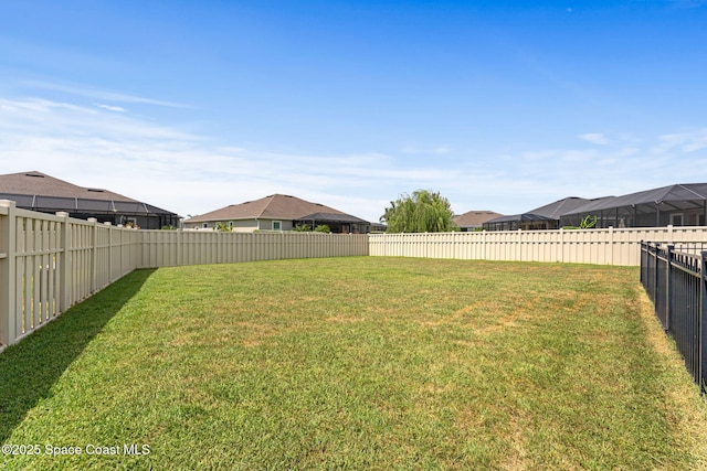 7684 Poulicny Ln, Melbourne, FL 32940 - fenced backyard featuring a residential view