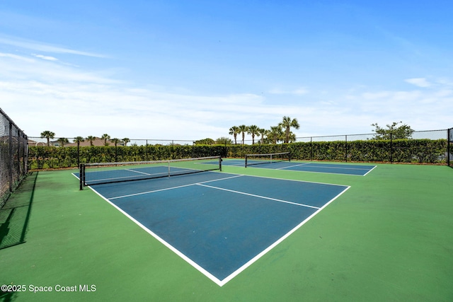 7684 Poulicny Ln, Melbourne, FL 32940 - view of tennis court with community basketball court
