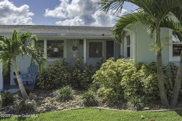 449 Amity Ave, Cocoa, FL 32927 - view of exterior entry with stucco siding