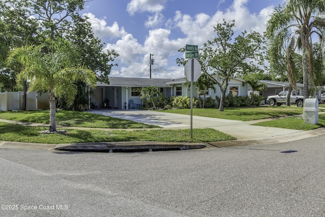 449 Amity Ave, Cocoa, FL 32927 - view of front of home with concrete driveway and an attached carport