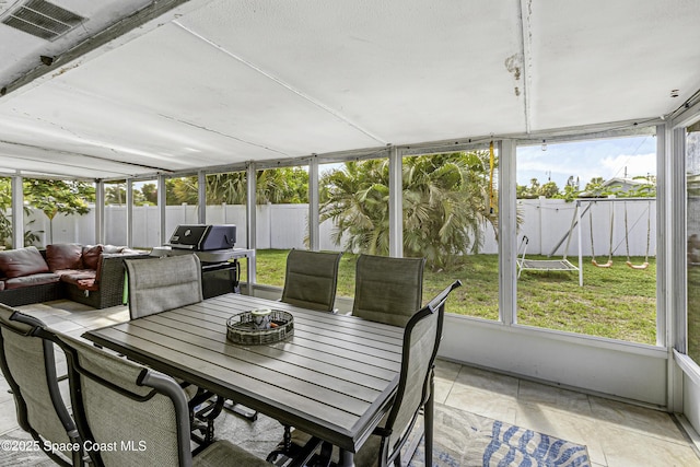 449 Amity Ave, Cocoa, FL 32927 - sunroom featuring outdoor dining area