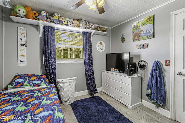 449 Amity Ave, Cocoa, FL 32927 - bedroom featuring wood finish floors, crown molding, and a ceiling fan