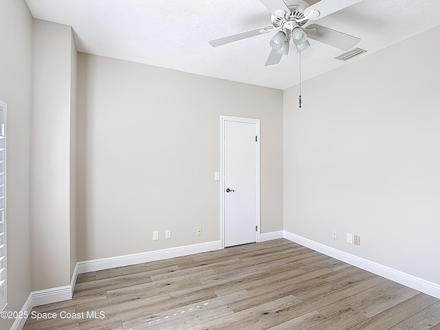 3090 Rio Pino S, Indialantic, FL 32903 - empty room featuring wood finished floors and a ceiling fan