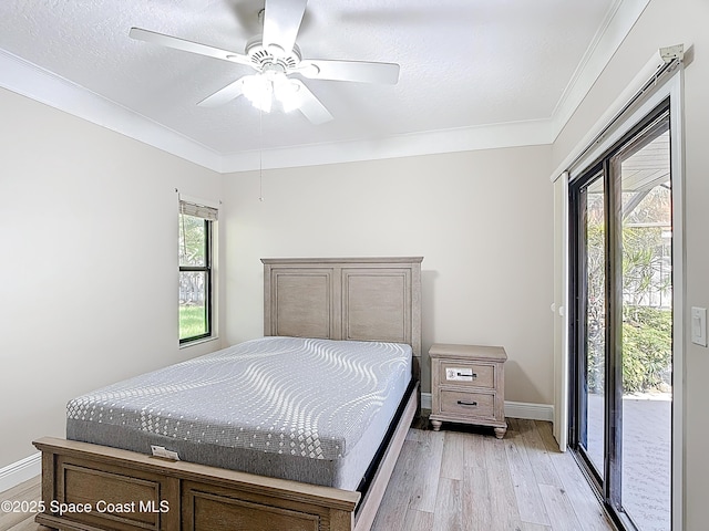 3090 Rio Pino S, Indialantic, FL 32903 - bedroom with access to outside, light wood finished floors, ceiling fan, and ornamental molding