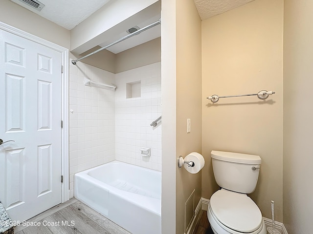 3090 Rio Pino S, Indialantic, FL 32903 - full bath with wood finished floors and shower / washtub combination