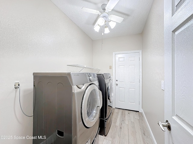 3090 Rio Pino S, Indialantic, FL 32903 - laundry area featuring separate washer and dryer, light wood-type flooring, and ceiling fan