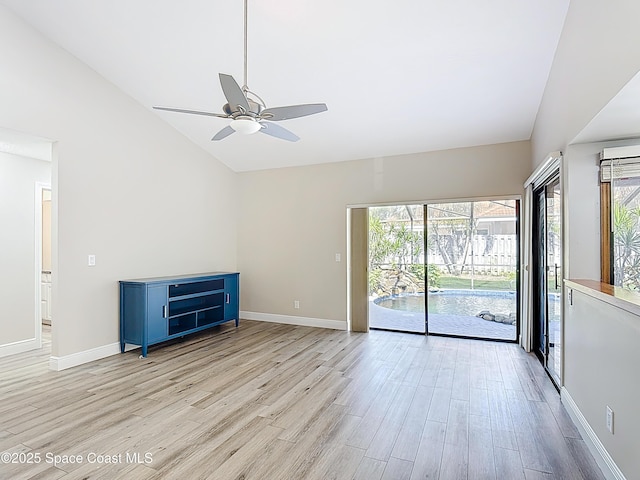 3090 Rio Pino S, Indialantic, FL 32903 - empty room with vaulted ceiling, light wood-style floors, and ceiling fan