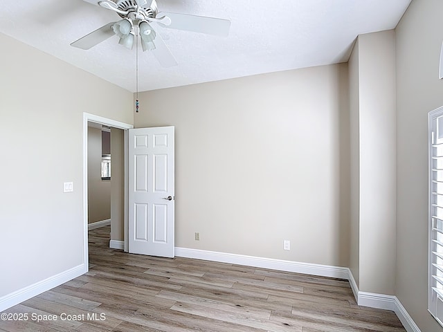 3090 Rio Pino S, Indialantic, FL 32903 - unfurnished room with wood finished floors and ceiling fan