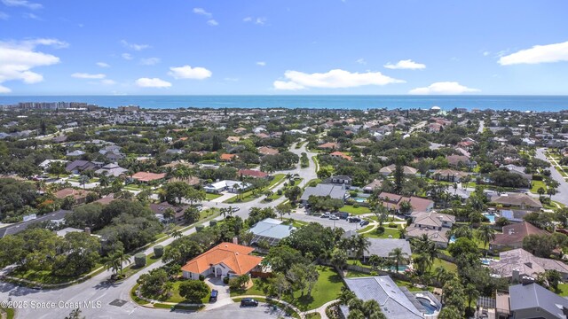 3090 Rio Pino S, Indialantic, FL 32903 - aerial view of property and surrounding area featuring a large body of water and nearby suburban area