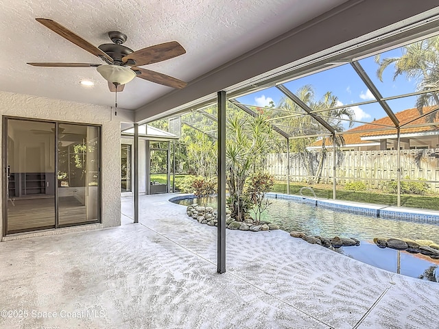 3090 Rio Pino S, Indialantic, FL 32903 - unfurnished sunroom with a ceiling fan
