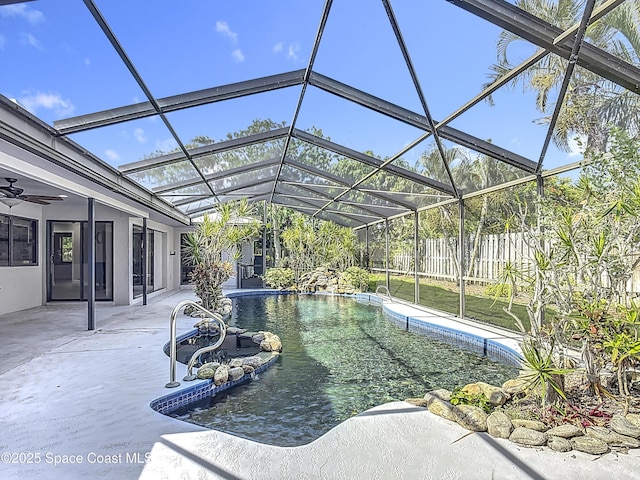 3090 Rio Pino S, Indialantic, FL 32903 - view of pool featuring a patio area, a ceiling fan, and glass enclosure