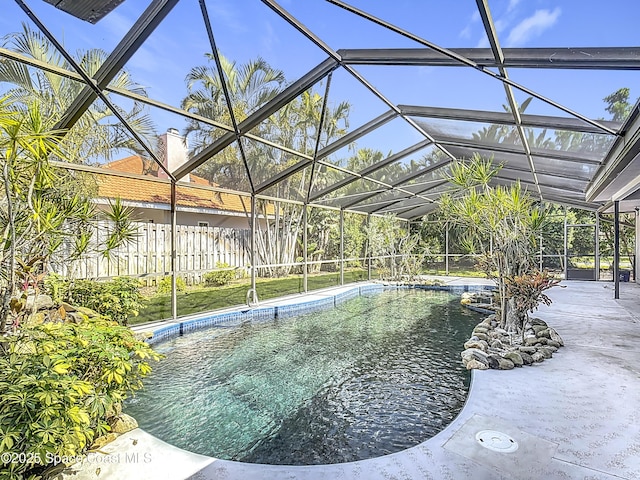 3090 Rio Pino S, Indialantic, FL 32903 - view of swimming pool with glass enclosure and a patio