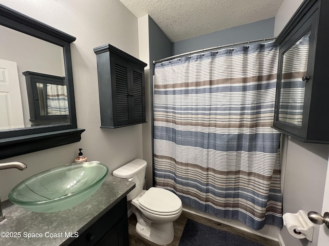 1015 Swiss Pointe Ln, Rockledge, FL 32955 - bathroom featuring vanity, a textured ceiling, and a shower with shower curtain