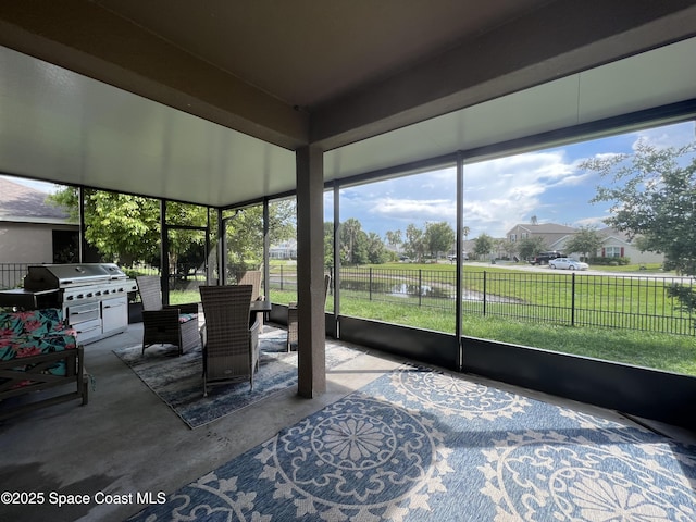 1015 Swiss Pointe Ln, Rockledge, FL 32955 - sunroom with concrete flooring