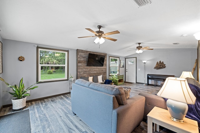 4685 Lee St, Cocoa, FL 32926 - living room featuring ceiling fan, wood finished floors, and lofted ceiling
