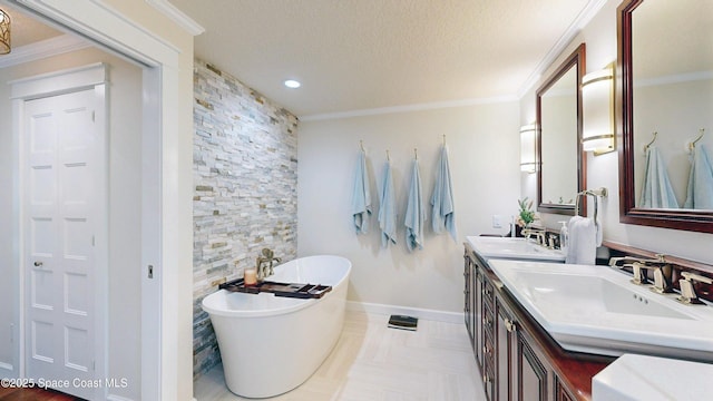211 Jamaica Dr, Cocoa Beach, FL 32931 - bathroom featuring double vanity, a soaking tub, a textured ceiling, ornamental molding, and recessed lighting