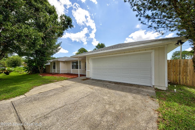 2169 Wagonwheel Ave SE, Palm Bay, FL 32909 - single story home with concrete driveway and a garage