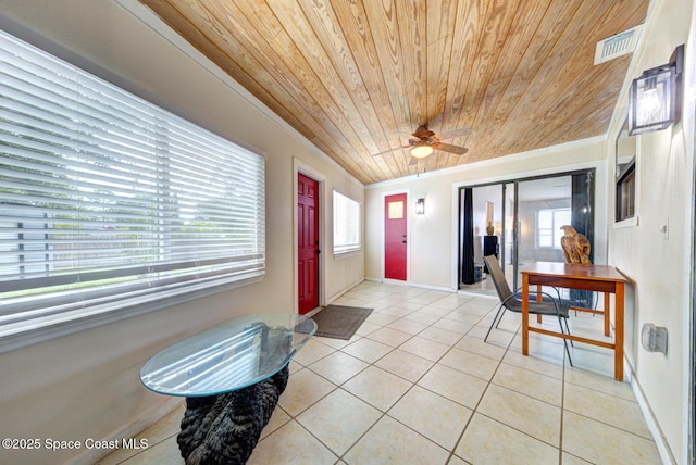 2169 Wagonwheel Ave SE, Palm Bay, FL 32909 - entrance foyer with wood ceiling, light tile patterned flooring, ornamental molding, and a ceiling fan