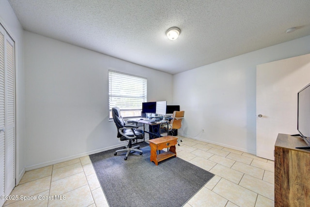 2169 Wagonwheel Ave SE, Palm Bay, FL 32909 - office space featuring tile patterned flooring and a textured ceiling