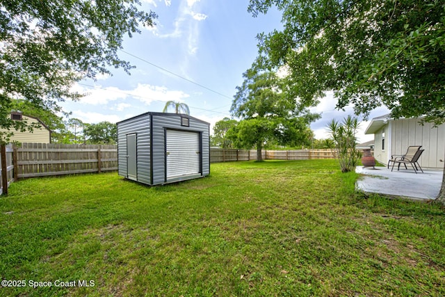 2169 Wagonwheel Ave SE, Palm Bay, FL 32909 - fenced backyard with a patio and a shed