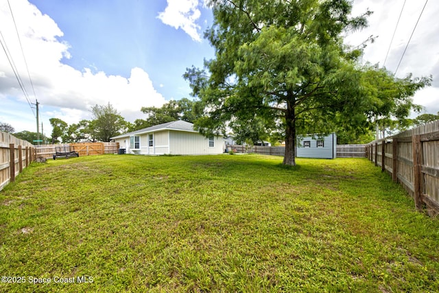 2169 Wagonwheel Ave SE, Palm Bay, FL 32909 - fenced backyard featuring a shed