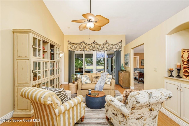 970 Pelican Ln, Rockledge, FL 32955 - living room with a ceiling fan and light wood-style floors