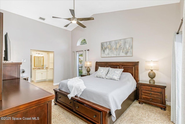 970 Pelican Ln, Rockledge, FL 32955 - bedroom with high vaulted ceiling, ensuite bathroom, and ceiling fan