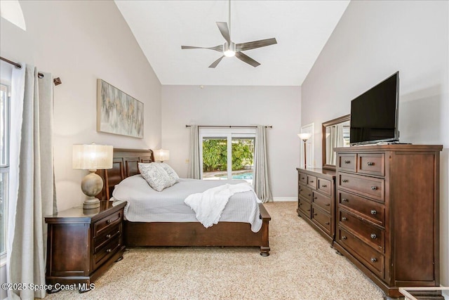 970 Pelican Ln, Rockledge, FL 32955 - bedroom with lofted ceiling, access to exterior, light colored carpet, and ceiling fan